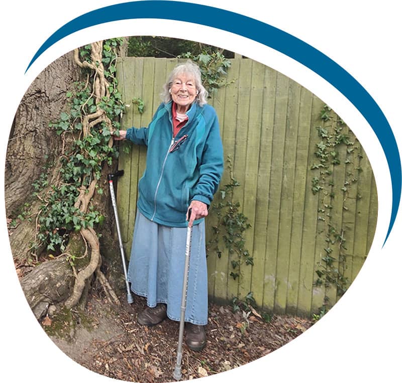 Elderly woman having physiotherapy at home in Mold
