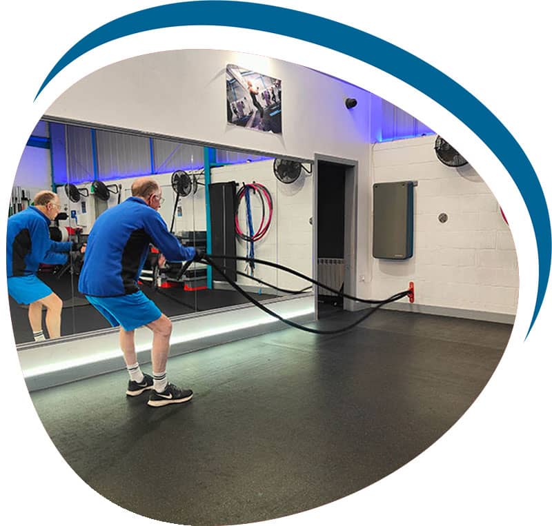 Over 60s man having PT session in Mold
